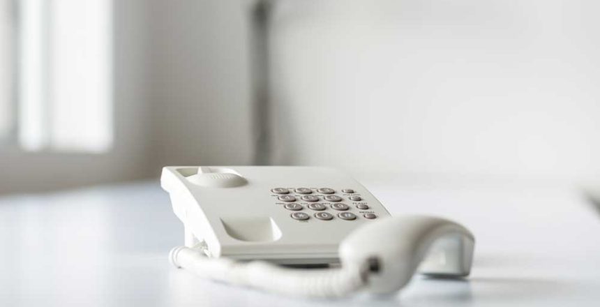 white-landline-telephone-with-handset-off-line-2022-05-10-23-54-47-utc